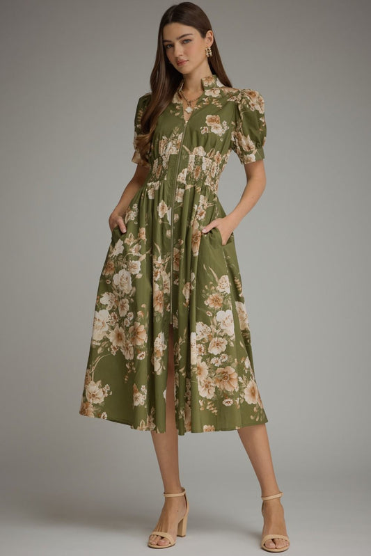 A feminine floral midi dress featuring short puff sleeves, a chic stand collar, a front zipper, and a flattering smocked waist.
