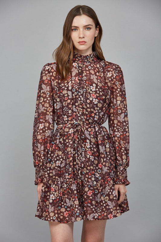 A romantic floral print dress featuring a ruffled high neckline, flattering tie waist, and flowing silhouette for effortlessly elegant style.