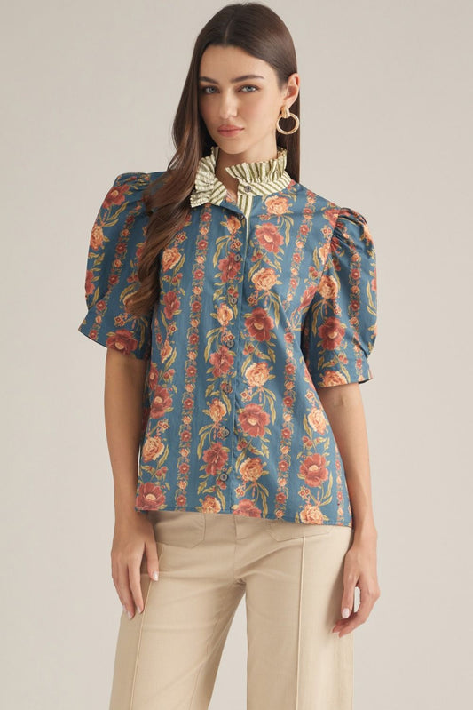 The Edith Floral Ruffle Neck Top brings feminine charm to everyday dressing with a delicate floral print, puff sleeves, and pretty contrast stripe detailing.