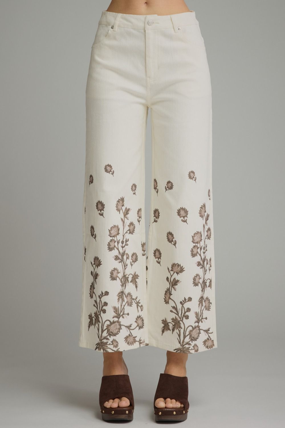 Make a statement in these lightweight floral wide leg pants, designed with a flattering flowy silhouette, functional pockets, and an easy zip-fly button closure.