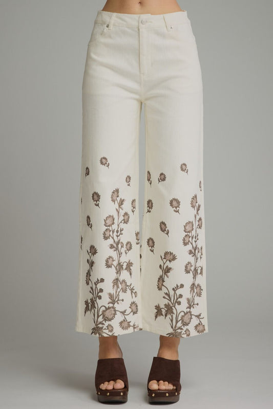 Make a statement in these lightweight floral wide leg pants, designed with a flattering flowy silhouette, functional pockets, and an easy zip-fly button closure.