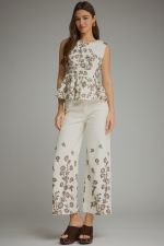 Make a statement in these lightweight floral wide leg pants, designed with a flattering flowy silhouette, functional pockets, and an easy zip-fly button closure.