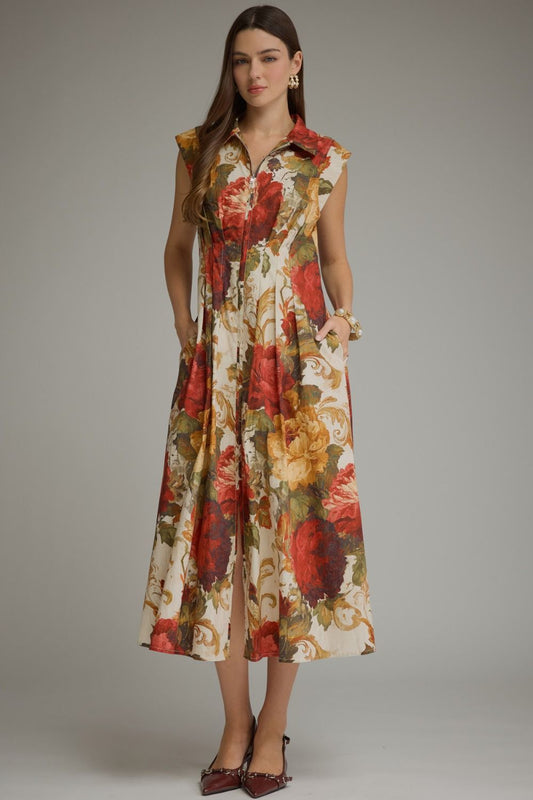 A feminine floral midi dress featuring a flattering foldover neckline, convenient front zipper, and effortless everyday elegance.