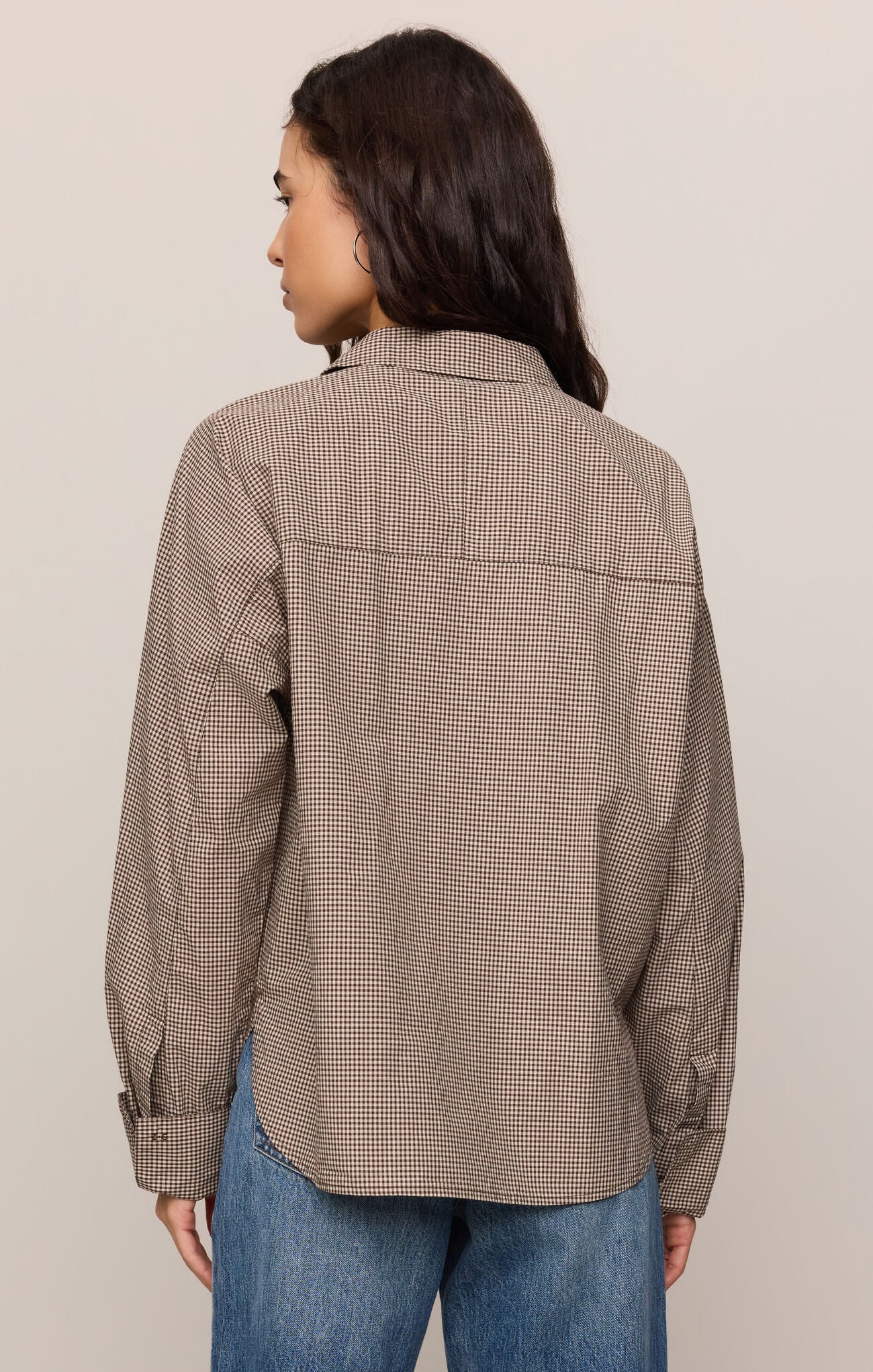 A timeless plaid button-down shirt crafted from crisp 100% cotton poplin with a classic collared silhouette for effortless everyday style.