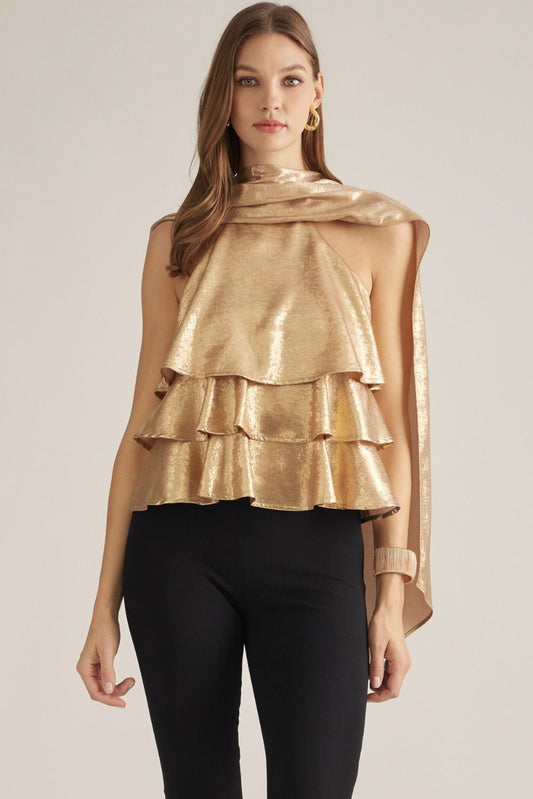 A feminine sleeveless top with layered ruffles, a high neckline, and a long self-tie scarf detail for an effortlessly polished look.