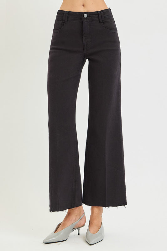 High-rise wide-leg pants with built-in tummy control and crisp crease-line detailing for a smooth, polished silhouette.