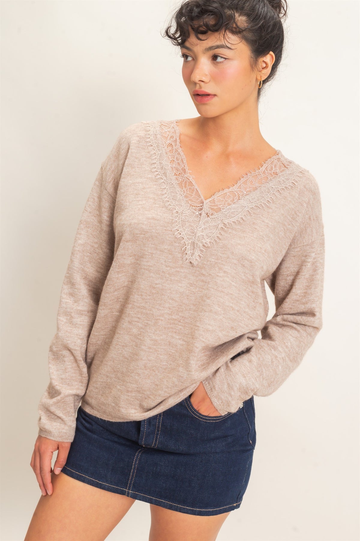 A feminine lace trim V-neck sweater featuring a relaxed silhouette, soft knit fabric, and elegant details for effortless everyday style.