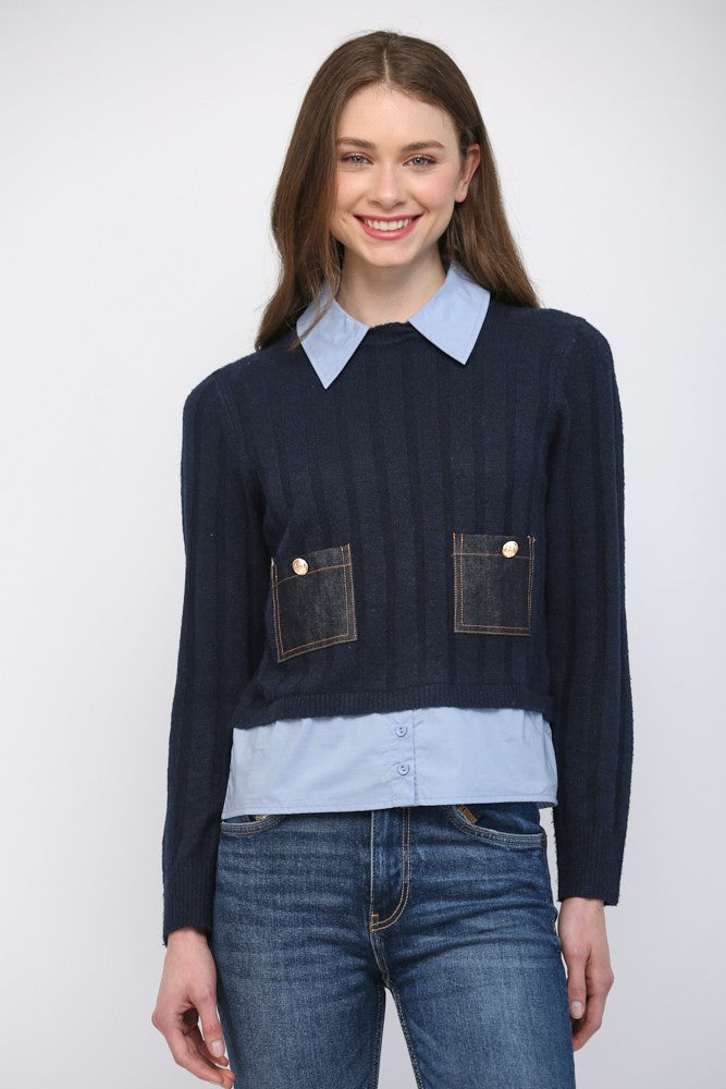 A cozy sweater featuring layered look denim details, patch pockets, and an effortlessly chic mixed-media design.