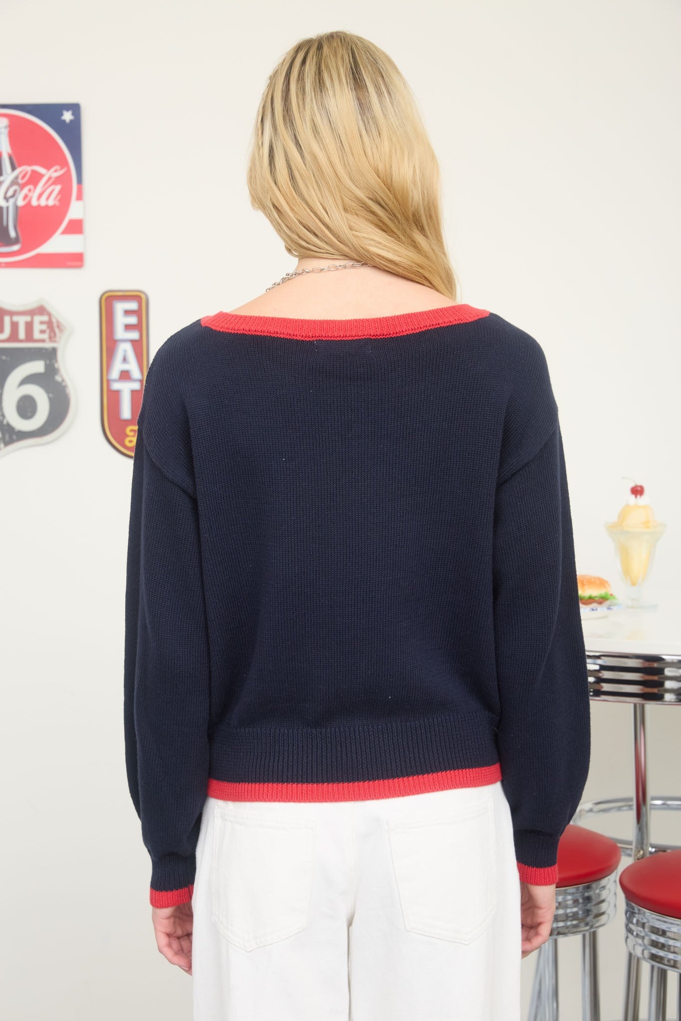 navy American flag knit sweater with red trim and long sleeves
