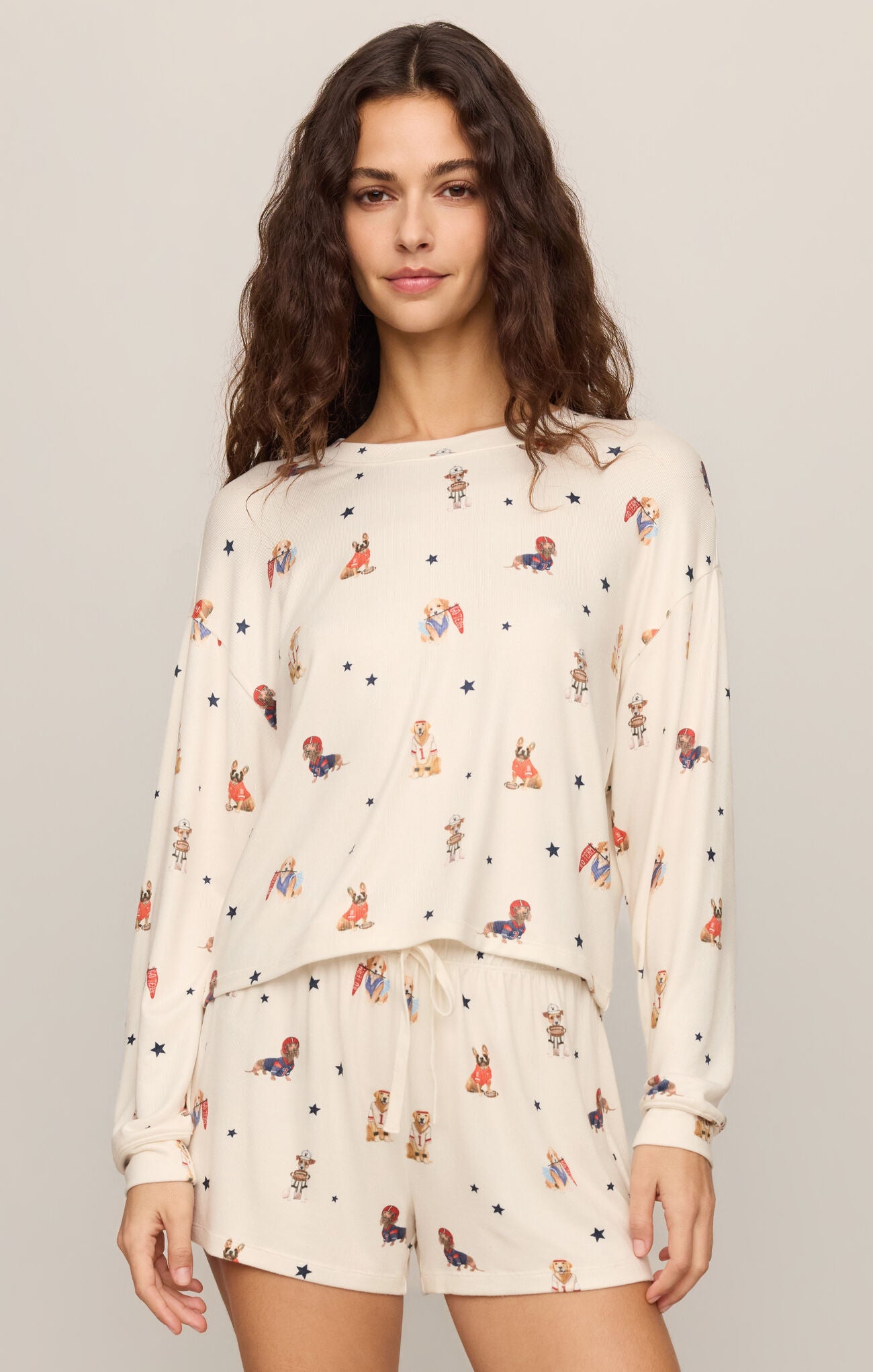 A luxurious silky jersey sleep top featuring a soft crew neckline, long sleeves, and a comfortable stretch fit for restful nights and relaxed mornings.