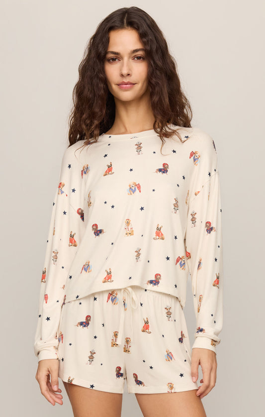 A luxurious silky jersey sleep top featuring a soft crew neckline, long sleeves, and a comfortable stretch fit for restful nights and relaxed mornings.