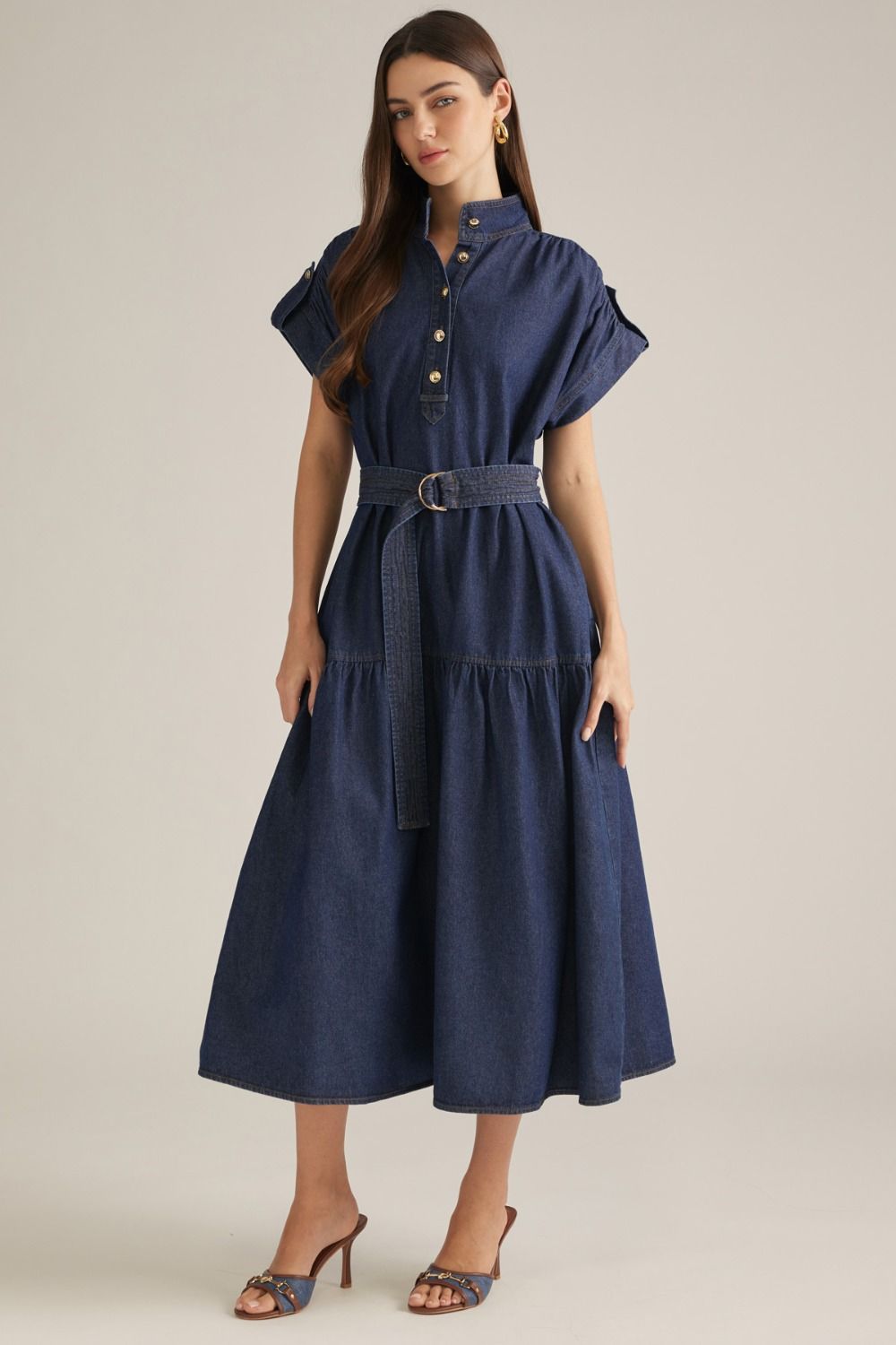 A timeless solid midi dress featuring a structured stand collar, cap sleeves, partial button front, and self-tie waist for an effortlessly polished silhouette.