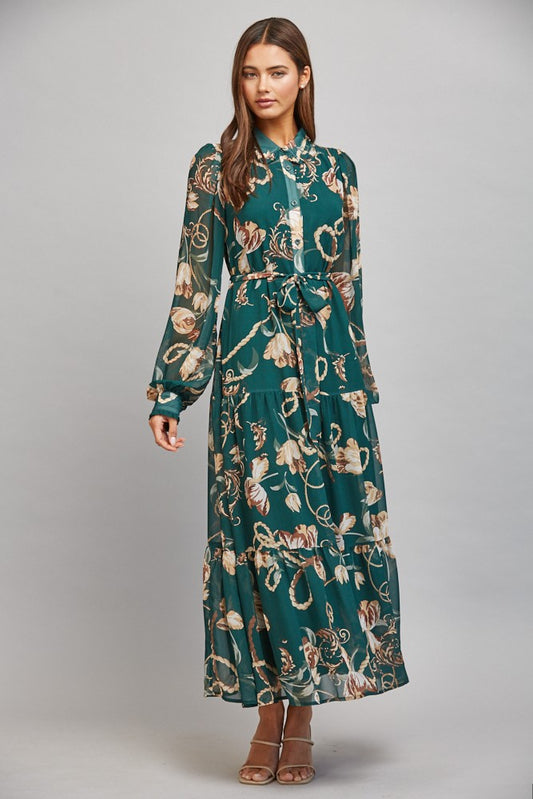 The Loretta Floral Chain Print Midi Dress combines an elegant mixed print with a flattering self-tie waist and breezy chiffon for effortlessly feminine style.