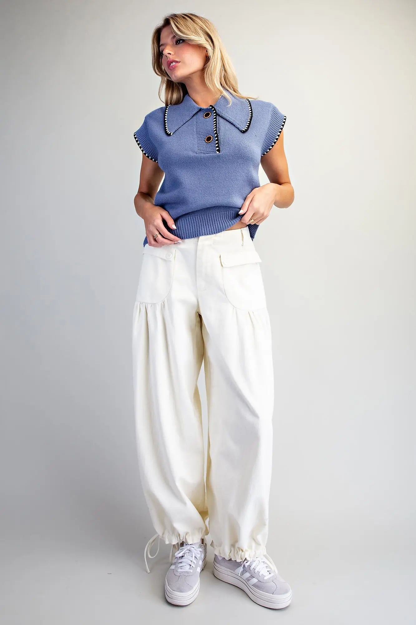 Relaxed mineral washed harem pants featuring adjustable tie cuffs, utility-inspired pockets, and a comfortable elastic back waistband for effortless everyday style.
