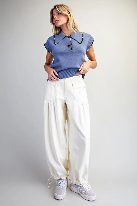 Relaxed mineral washed harem pants featuring adjustable tie cuffs, utility-inspired pockets, and a comfortable elastic back waistband for effortless everyday style.