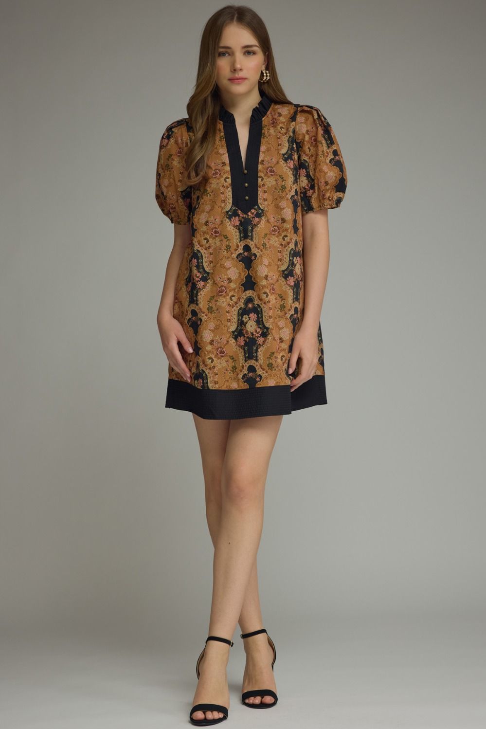  feminine printed mini dress featuring romantic puff sleeves, a contrast ruffle neckline, and lightweight comfort for effortless everyday elegance.