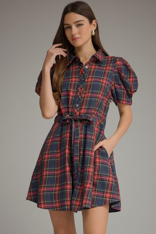 A charming plaid mini dress featuring feminine puff sleeves, a classic shirt collar, and a self-tie waist for a flattering silhouette.


