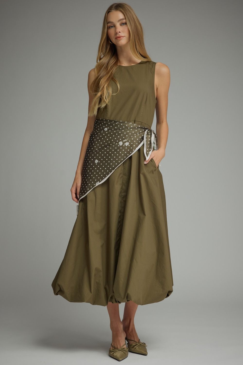 Effortlessly elegant and undeniably unique, the Sable Scarf Dress blends modern sophistication with artistic detail for a statement look you'll love.