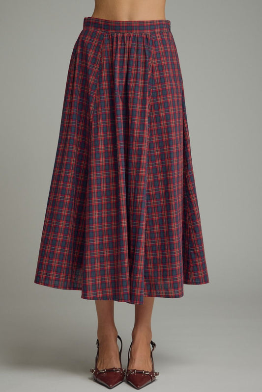 A timeless plaid midi skirt featuring flattering gathered detail, a comfortable elastic-back waist, and practical side pockets.
