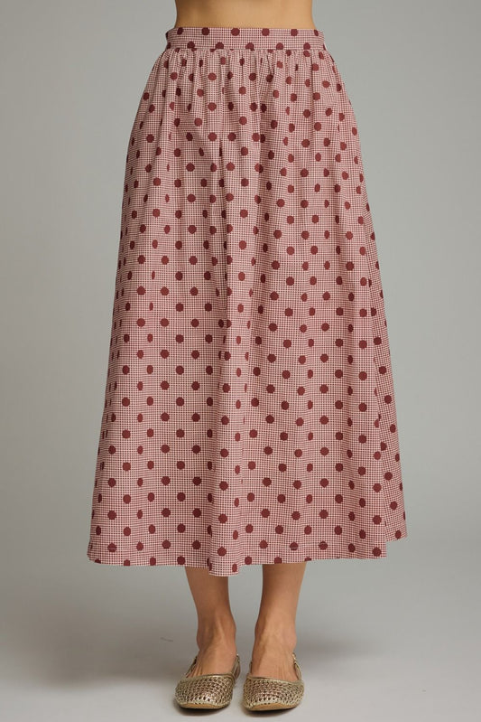 A charming gingham polka dot midi skirt featuring a gathered waist, functional pockets, and a lightweight lined design for effortless feminine style.