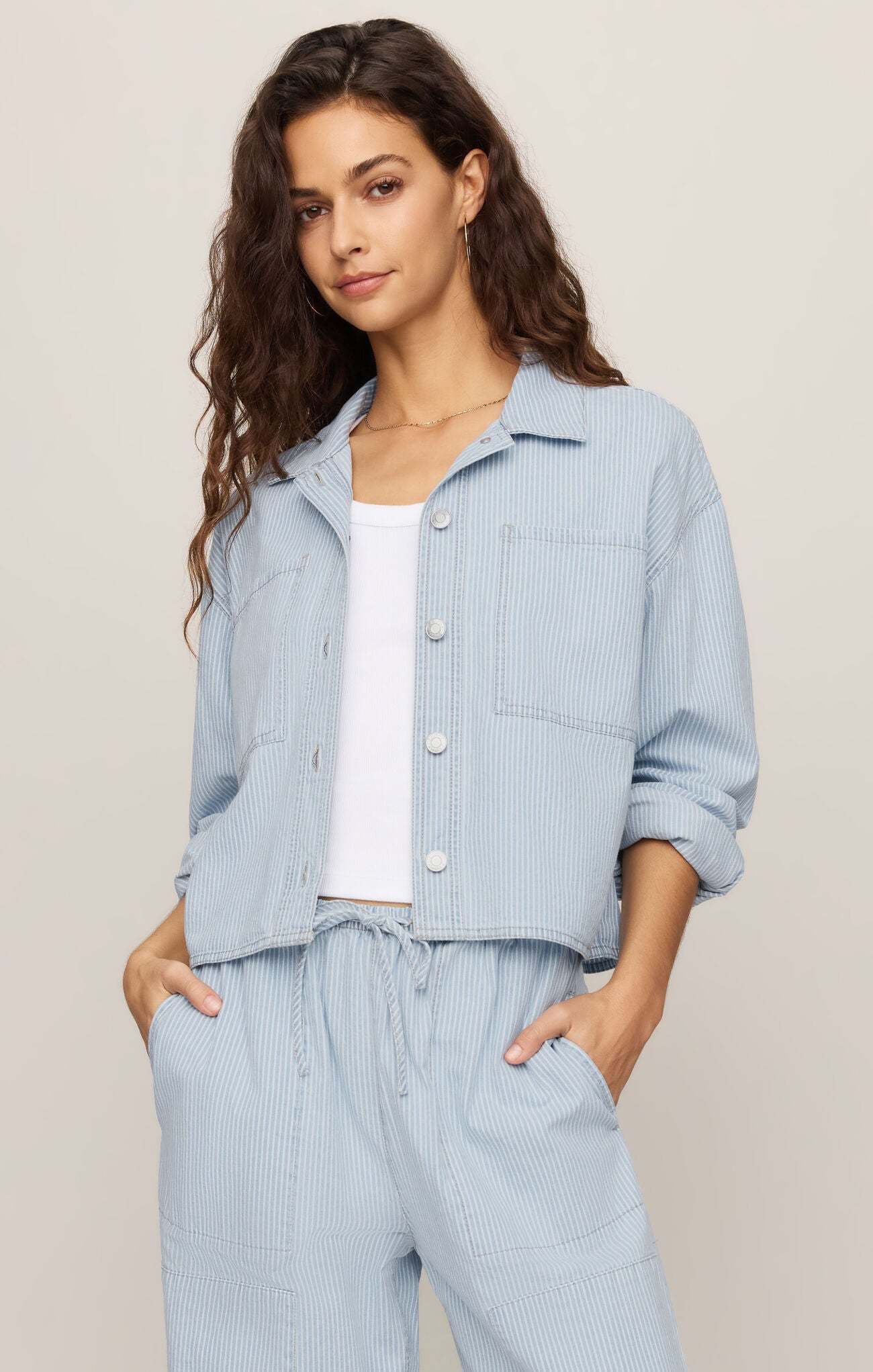 Women’s ultra-soft 100% cotton denim shirt with Y/D stripe pattern, collared neckline, long sleeves, button front closure, and chest pockets.