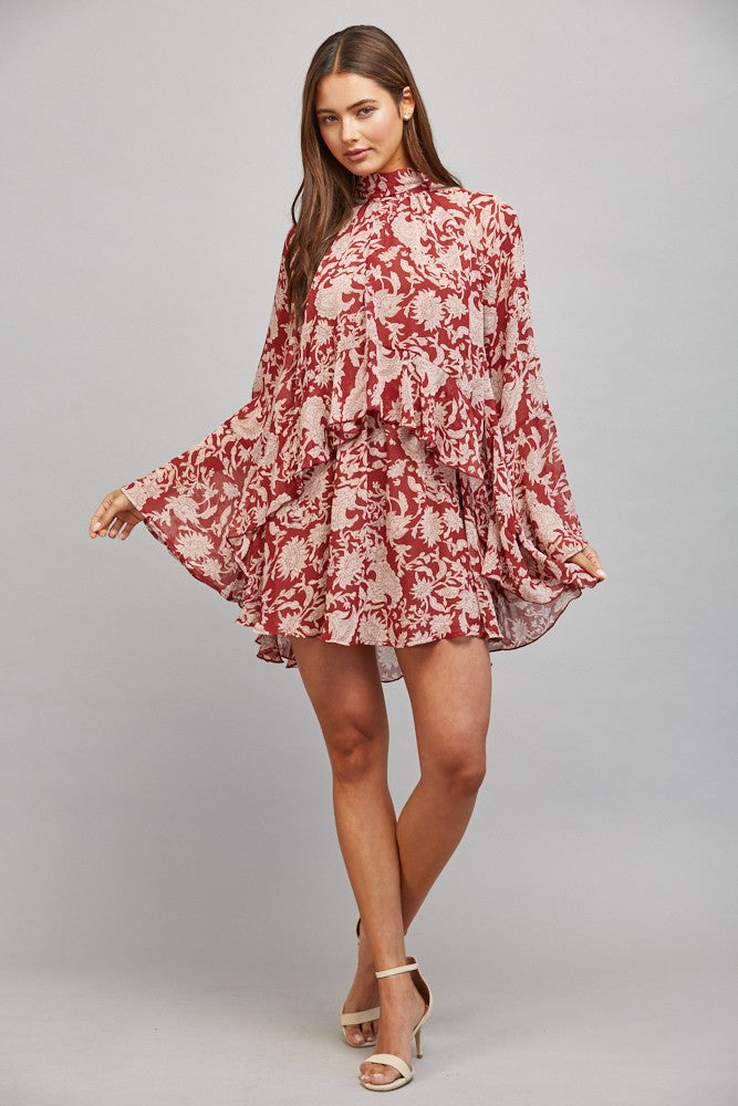 romantic dress that was made to turn heads, a sophisticated high neckline and an elegant tie-back detail, this floral dress offers timeless style with just the right touch of charm.