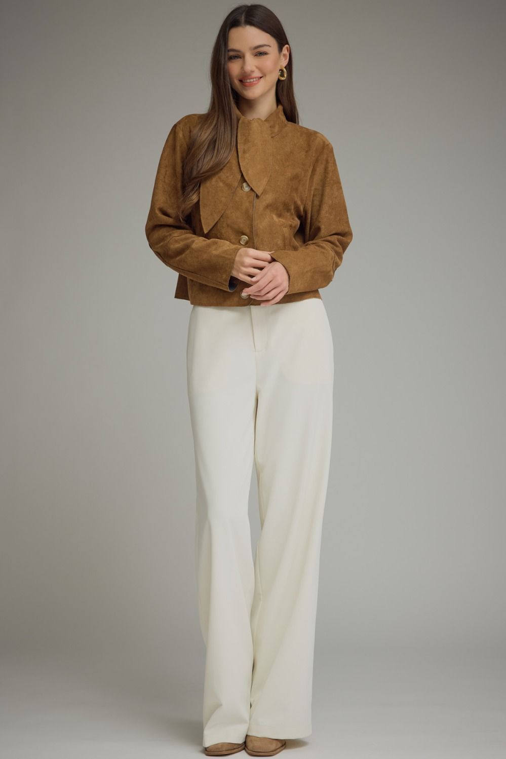 A chic cropped jacket featuring a feminine self-tie neckline, button-front closure, and raw-edge hem for an effortlessly stylish finish.