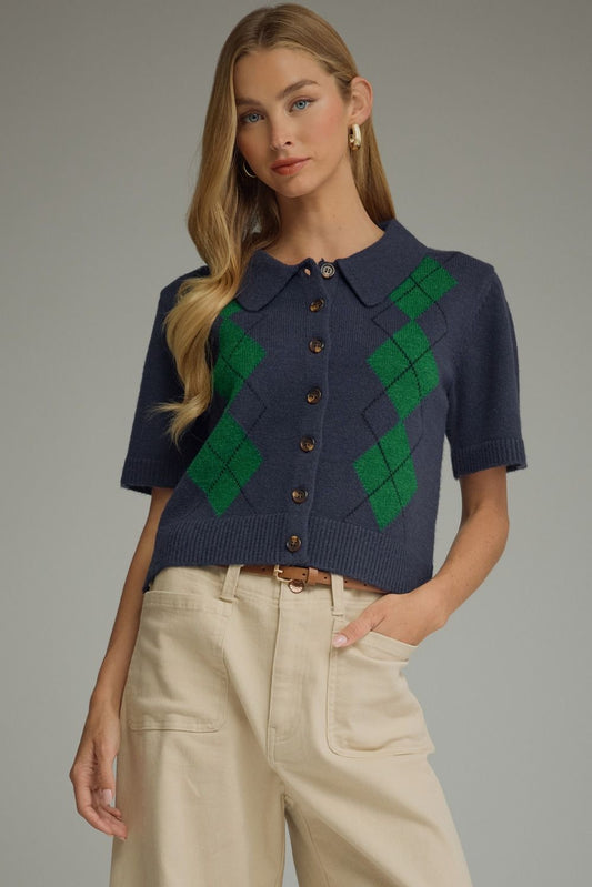 A lightweight argyle knit sweater featuring a classic collar, button-front closure, and ribbed trim for polished everyday layering.
