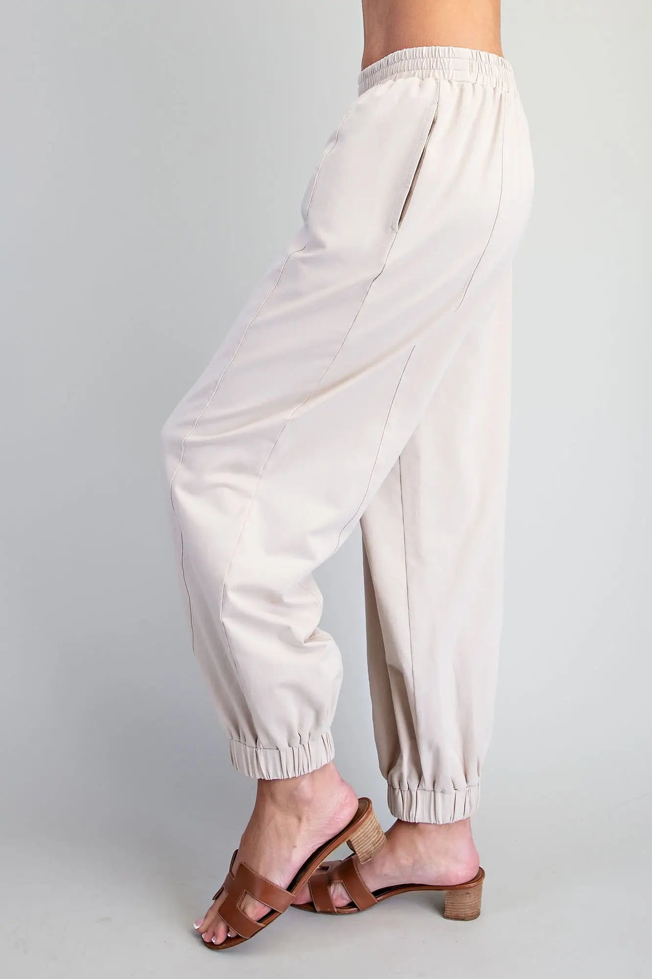 Comfort meets effortless style in these relaxed joggers featuring an elastic waistband, tapered legs, and modern panel detailing.
