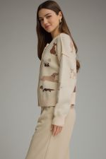 A chic animal print cardigan that brings effortless style and cozy sophistication to everything from denim and boots to polished workwear.