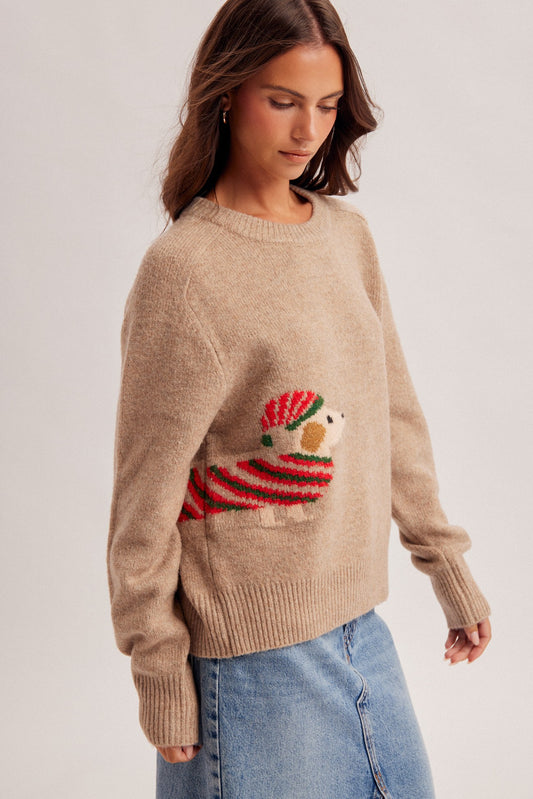 Cozy up for the holidays in this festive crew neck sweater featuring an adorable Christmas dog design and a soft, comfortable knit feel.

