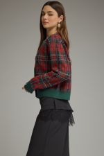 A polished plaid knit jacket featuring elegant jeweled trim, a classic button-front closure, and ribbed finishes for a sophisticated seasonal layer.