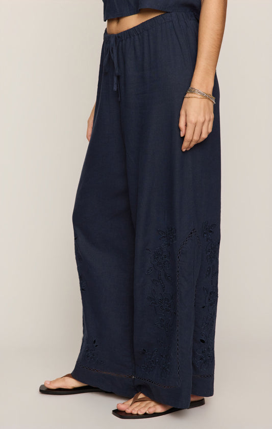 Navy blue wide-leg pants with lace detailing 