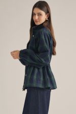A lightweight plaid jacket featuring a high neckline, adjustable drawstring waist, and zip-front design for effortless seasonal layering.