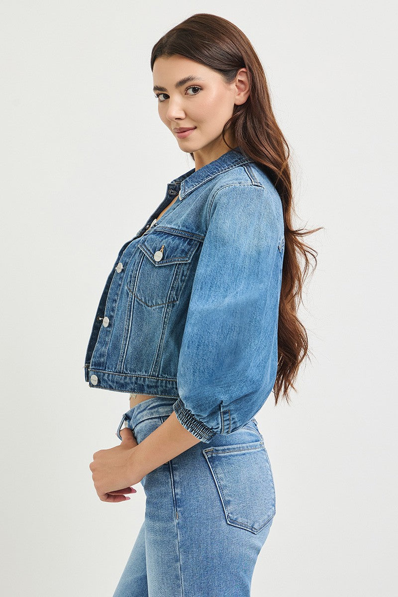 The Josephine Cropped Jacket makes a statement with a flattering cropped length and dramatic three-quarter balloon sleeves.
