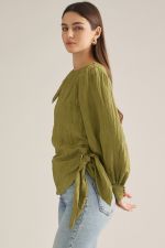 Elevate your wardrobe with this chic long-sleeve blouse featuring a straight neckline, feminine shoulder tie, and flattering side-wrap detail.

