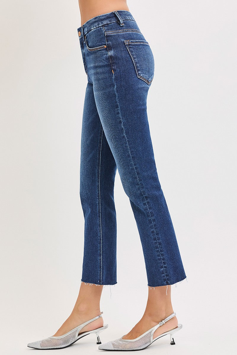 The Harriet Tummy Control Crop Straight Jeans combine a flattering high-rise fit with tummy-smoothing support, comfortable stretch, and a versatile dark wash.
