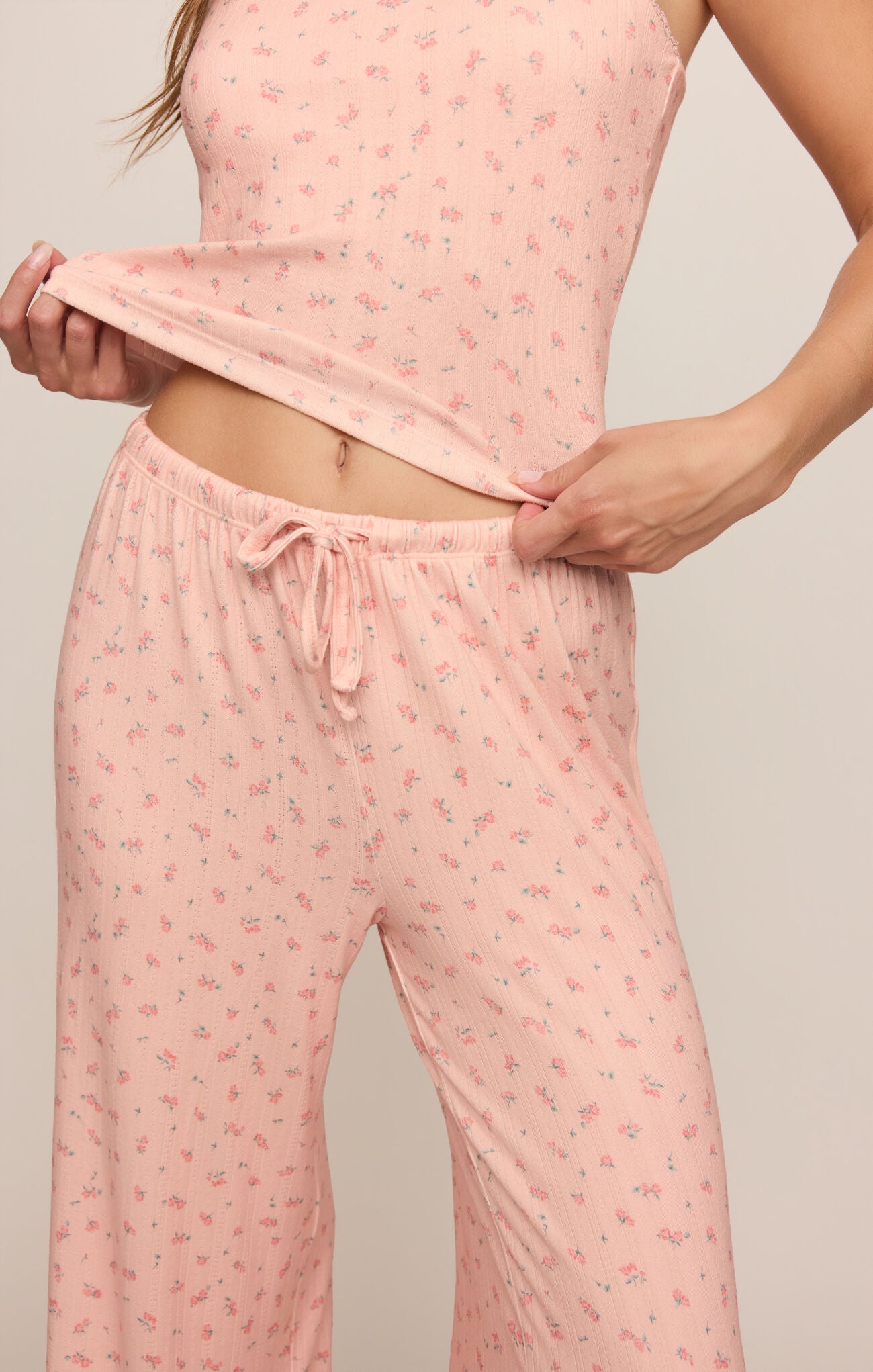 Elegant comfort meets effortless style in these high-rise silky pointelle floral pants featuring a soft stretch feel and relaxed, flattering fit.
