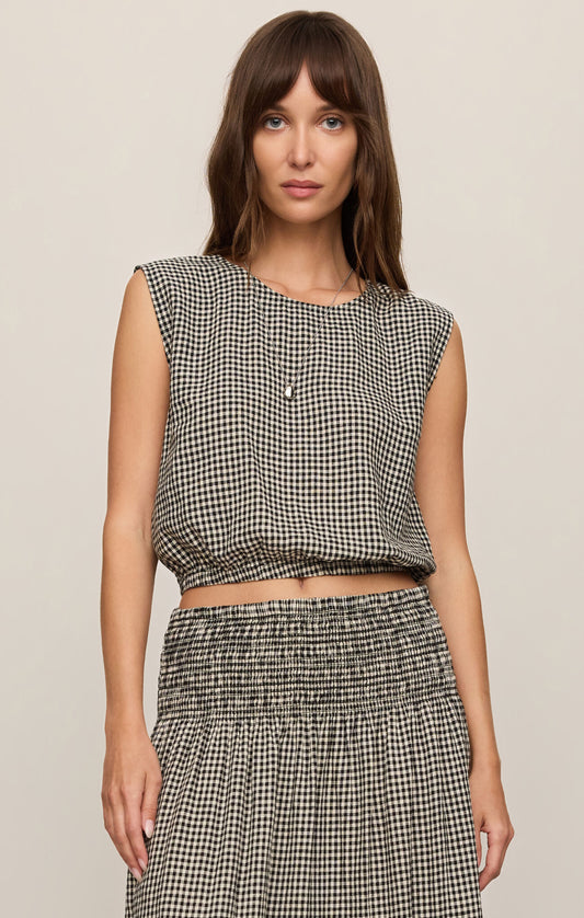A breezy plaid linen-blend bubble top featuring a classic crew neckline and a flattering billowy silhouette for effortlessly elevated warm-weather style.
