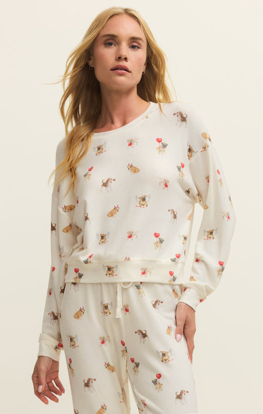 Z Supply Bisous Love Pup Top delivers ultra-soft comfort and a relaxed, midweight feel in a perfectly cropped silhouette.