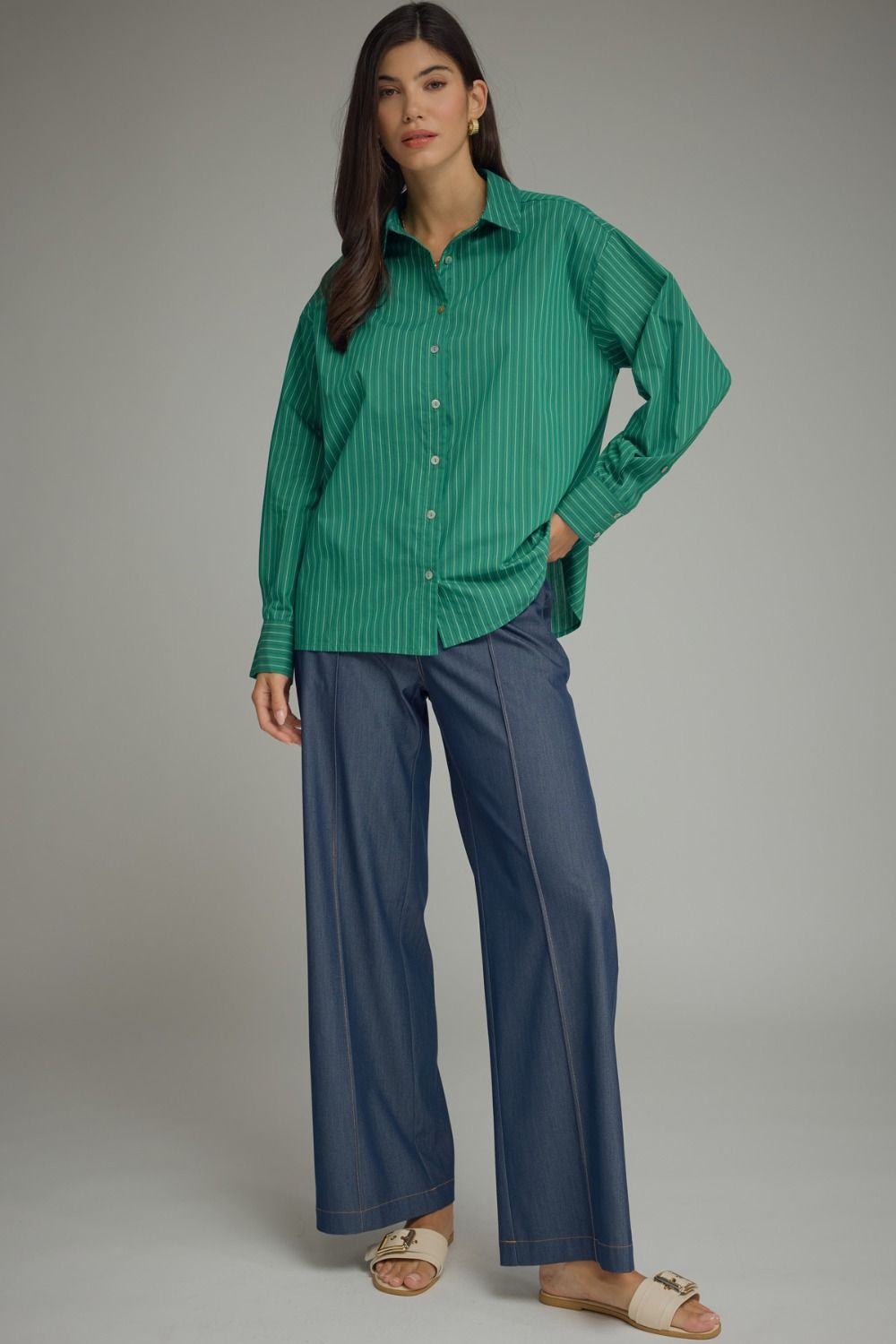 Classic meets contemporary in this lightweight striped button-front blouse, featuring crisp tailoring and an effortlessly polished silhouette.