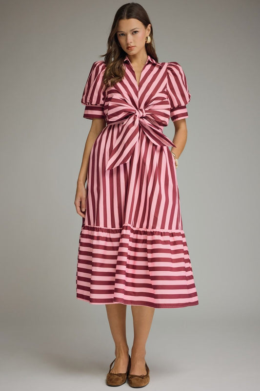 A timeless striped midi dress featuring puff sleeves, a self-tie front, and a collared neckline for effortlessly polished style.
