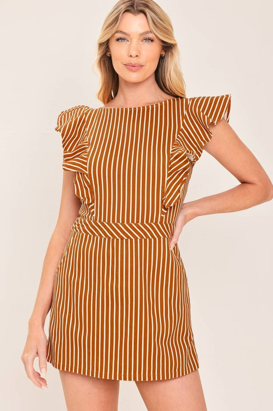 A playful printed skort romper featuring a feminine ruffle sleeve, classic round neckline, and easy back zipper closure for effortless one-and-done style.