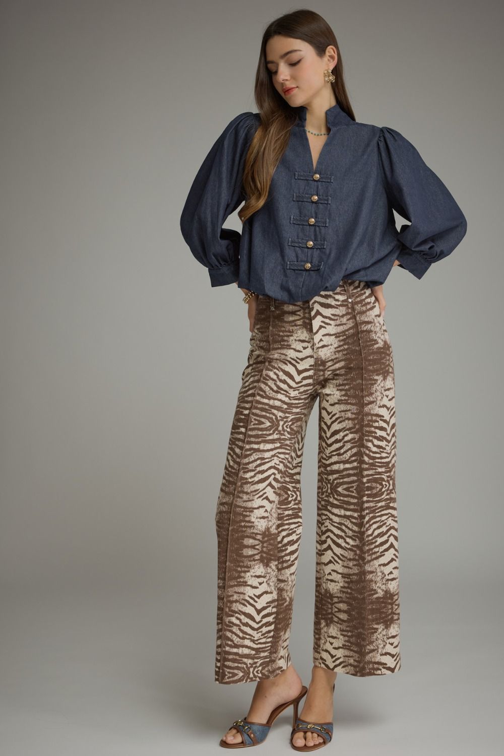 Make a statement in these chic animal print wide-leg pants, designed with a flattering silhouette, comfortable stretch, and classic pocket details.

