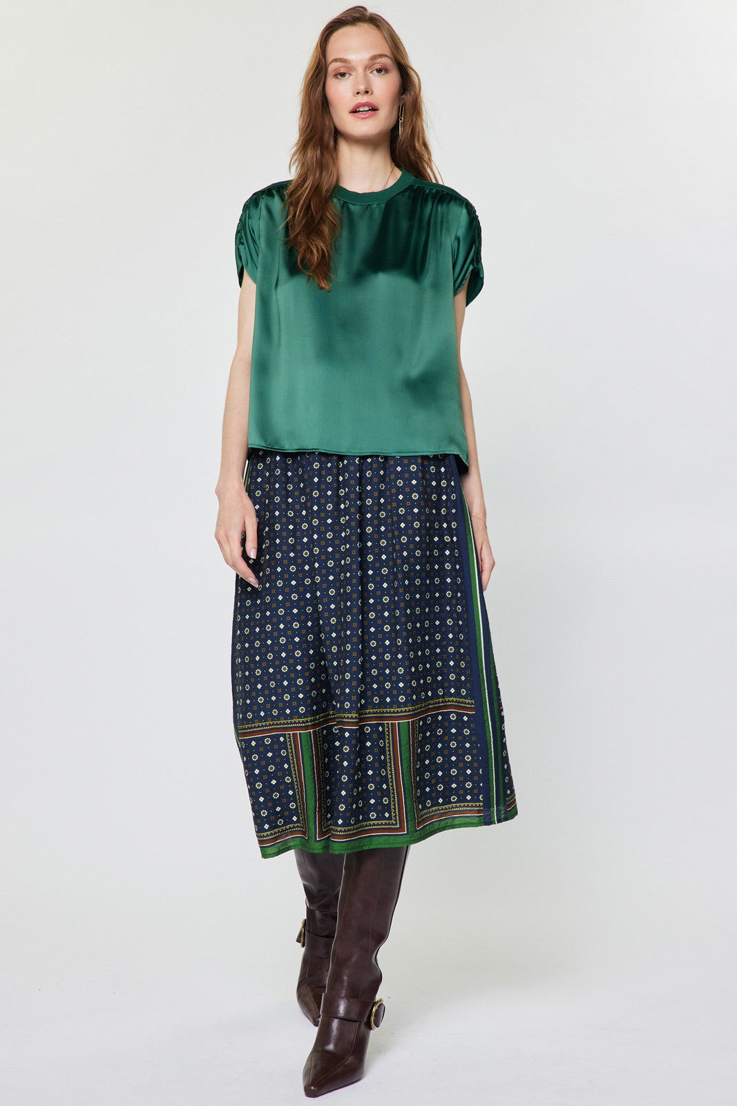 A chic satin-finish blouse featuring contrast neckline and shoulder details, gathered shoulders, and a relaxed boxy fit for effortlessly elevated everyday style.