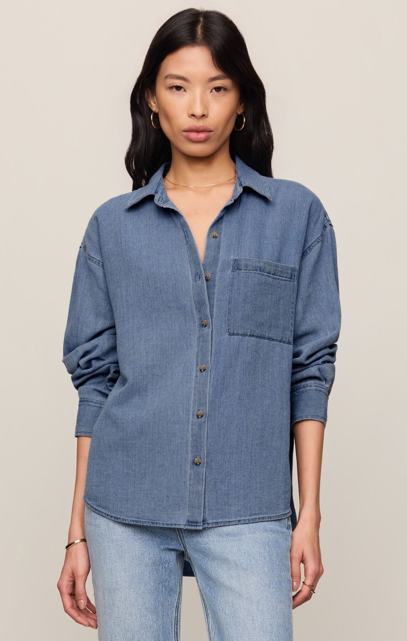 front cotton indigo button up twill shirt featuring a collared neckline, and 3/4 sleeves
