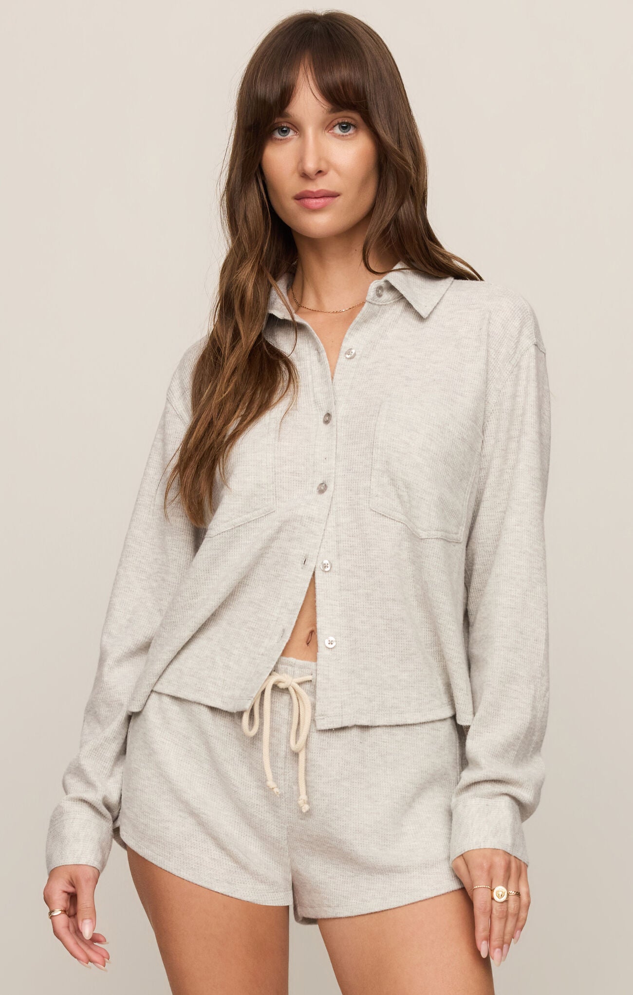 A cozy brushed thermal top featuring a classic collar, button-front design, and soft stretch fabric for effortless everyday comfort.
