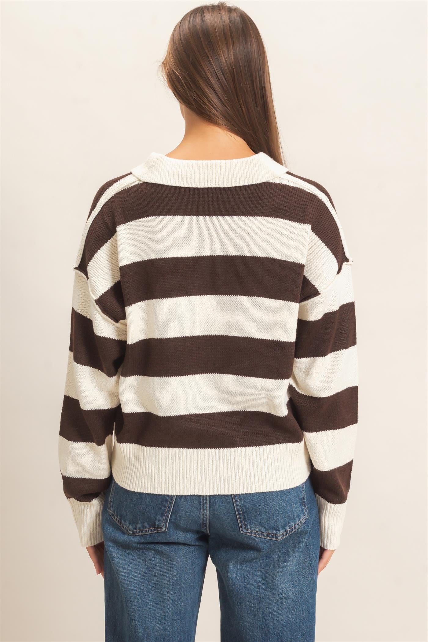 A relaxed striped sweater with a statement wide collar and ribbed cuffs that brings effortless polish to everyday casual style.