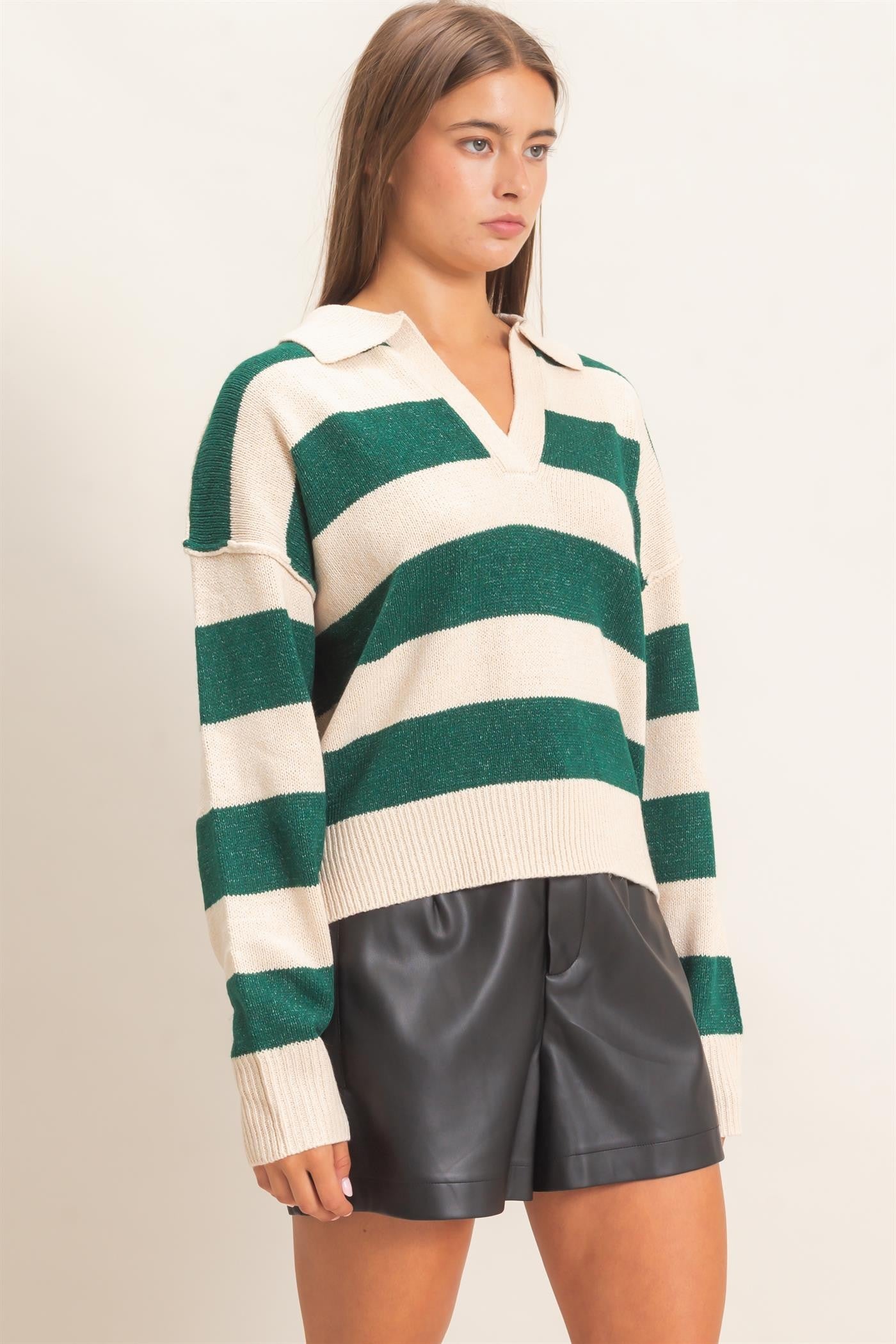 A relaxed striped sweater with a statement wide collar and ribbed cuffs that brings effortless polish to everyday casual style.