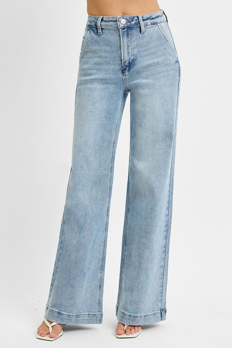 Classic denim meets modern style in these high-rise wide-leg jeans featuring flattering slanted front pockets and an effortlessly chic silhouette.